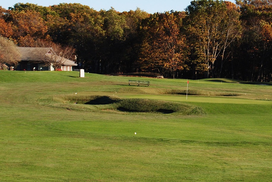 Wide fairway leading to two bunkers before the green.
